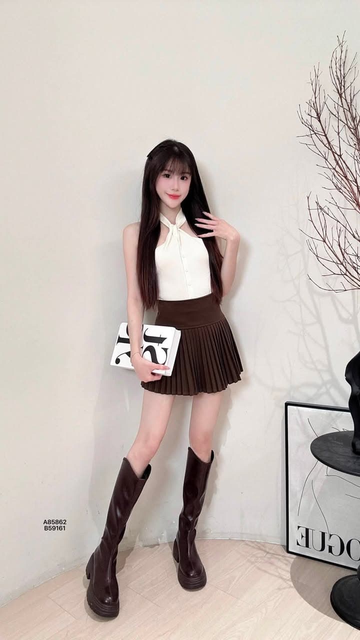 辣妹“扭转设计感”针织上衣